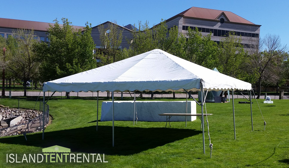 20 × 20 tent set up in an open park